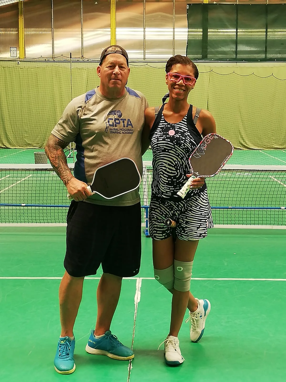 Alicia Wolfgruber with Brett Noel, three-time US National Gold Medalist and coach