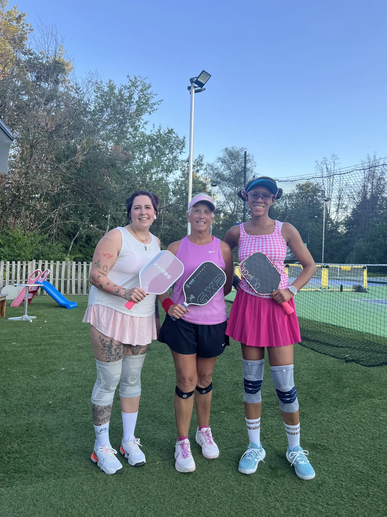Players together at a pickleball community event
